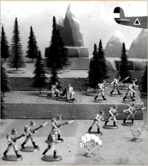 A bit of pseudo-nostalgia: this one is from a game involving a Berglander attack with air and armoured support.  the tanks are slightly modified Fiat 3000's from Anyscale Models and the plane is scratchbuilt based on those cheap flat balsawood gliders.